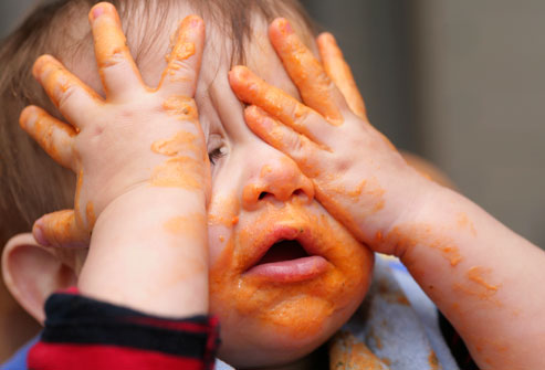 getty_rf_photo_of_baby_covered_in_sauce